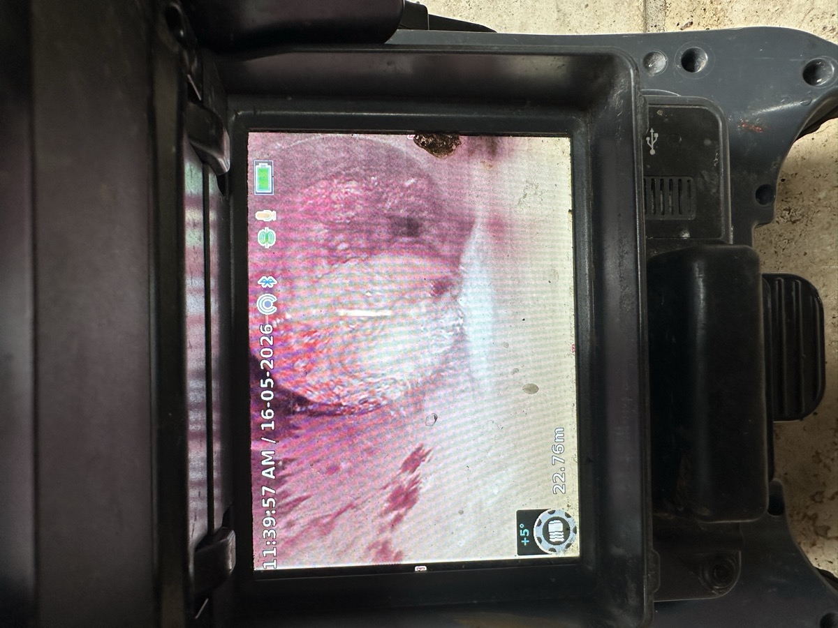 CCTV drain camera screen showing tree roots blocking a clay sewer pipe at 22.76 metres depth in South Coogee